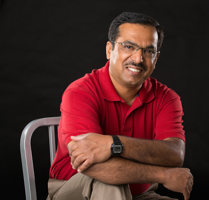 Photo of Jay Reddy sitting and posting